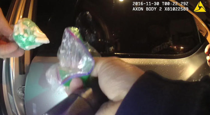 Prosecutors say third body-camera video of ‘questionable activity’ by police emerges, drop dozens more cases