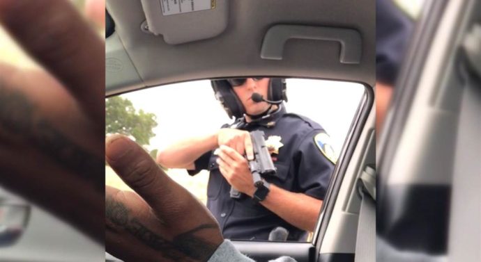 Why Did Police Officer in Traffic Stop Point Gun at Man for Nine Minutes?